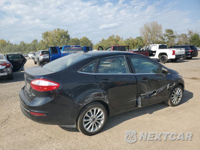 Trzecie zdjęcie samochodu z tyłu: 2017 FORD FIESTA TITANIUM VIN:3FADP4CJ3HM129664 - miniatura