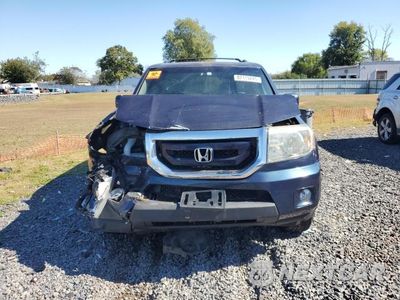 Piąte zdjęcie samochodu w środku: 2011 HONDA PILOT EX VIN:5FNYF4H41BB016244 - miniatura