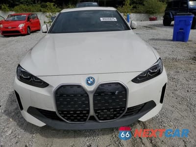 Piąte zdjęcie samochodu w środku: 2024 BMW I4 EDRIVE 35 GC VIN:WBY43AW0XRFR52034 - miniatura