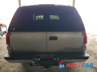 Zdjęcie 6 z 12 samochodu: 1999 CHEVROLET TAHOE K1500 VIN:1GNEK13R9XJ457367 - miniatura