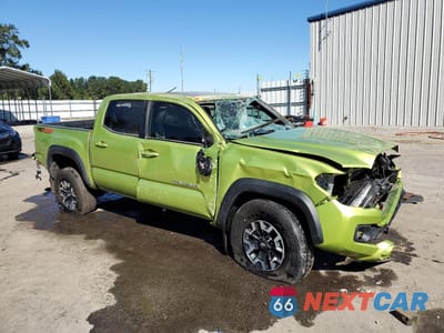 Czwarte zdjęcie samochodu z boku: 2023 TOYOTA TACOMA TRD OFF-ROAD VIN:3TYCZ5AN9PT157130 - miniatura