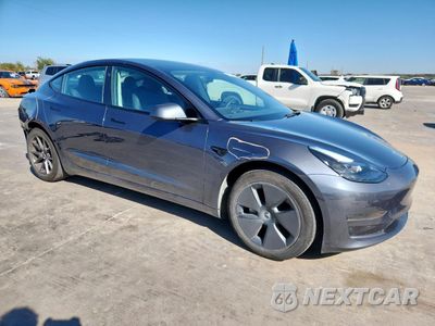 Czwarte zdjęcie samochodu z boku: 2023 TESLA MODEL 3 VIN:5YJ3E1EA4PF655716 - miniatura