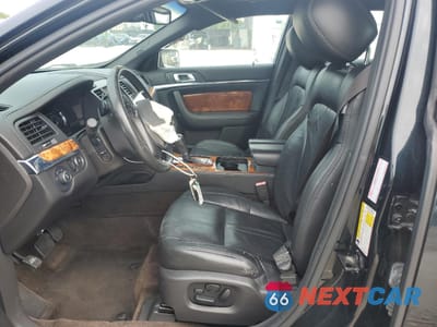 Zdjęcie 7 z 14 samochodu: 2014 LINCOLN MKS VIN:1LNHL9EK8EG600624 - miniatura