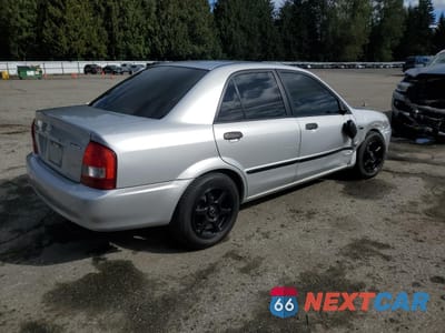 Trzecie zdjęcie samochodu z tyłu: 2003 MAZDA PROTEGE DX VIN:JM1BJ225130149550 - miniatura