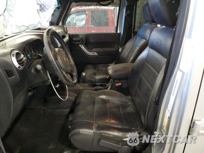 Zdjęcie 7 z 12 samochodu: 2012 JEEP WRANGLER UNLIMITED SAHARA VIN:1C4BJWEG2CL167042 - miniatura