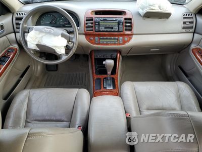 Zdjęcie 8 z 14 samochodu: 2003 TOYOTA CAMRY LE VIN:JTDBF30K430125288 - miniatura