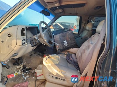 Zdjęcie 7 z 14 samochodu: 1999 CHEVROLET TAHOE K1500 VIN:1GNEK13R3XJ513285 - miniatura