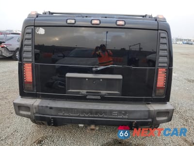 Zdjęcie 6 z 13 samochodu: 2003 HUMMER H2 VIN:5GRGN23U03H137888 - miniatura