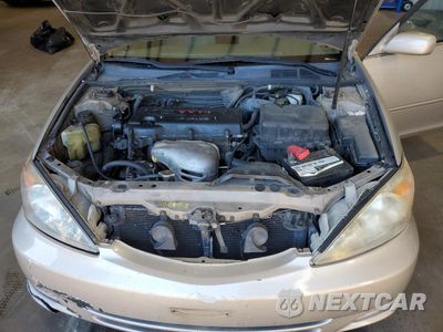 Zdjęcie 11 z 11 samochodu: 2003 TOYOTA CAMRY LE VIN:4T1BE32K93U655373 - miniatura