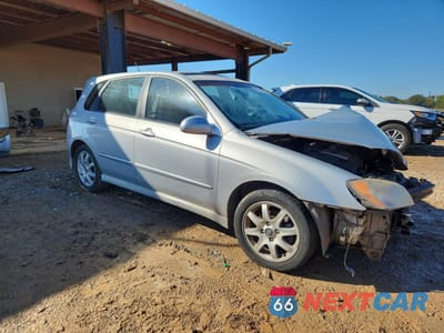 Czwarte zdjęcie samochodu z boku: 2005 KIA SPECTRA5 VIN:KNAFE161X55075460 - miniatura