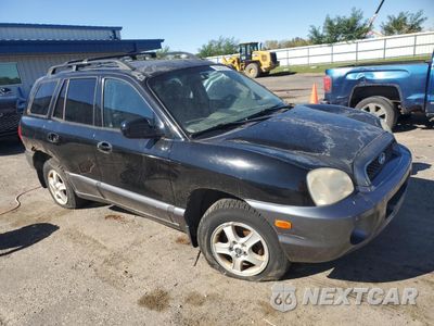 Czwarte zdjęcie samochodu z boku: 2004 HYUNDAI SANTA FE GLS VIN:KM8SC73D34U686584 - miniatura