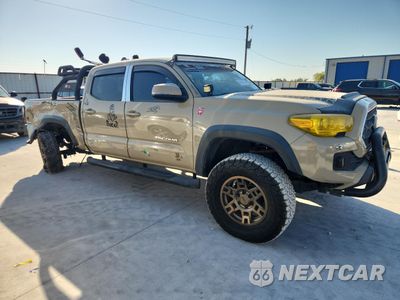 Czwarte zdjęcie samochodu z boku: 2018 TOYOTA TACOMA DOUBLE CAB VIN:3TMDZ5BN0JM051509 - miniatura