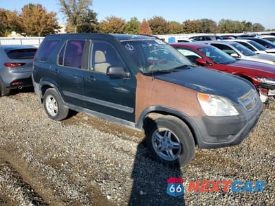 Czwarte zdjęcie samochodu z boku: 2002 HONDA CR-V LX VIN:JHLRD78442C070407 - miniatura