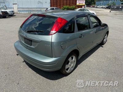 Piąte zdjęcie samochodu w środku: 2005 FORD FOCUS ZX5 VIN:3FAFP37NX5R125433 - miniatura
