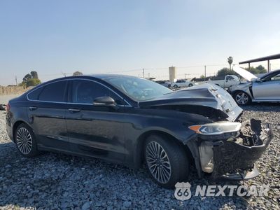 Czwarte zdjęcie samochodu z boku: 2017 FORD FUSION TITANIUM VIN:3FA6P0K91HR130162 - miniatura