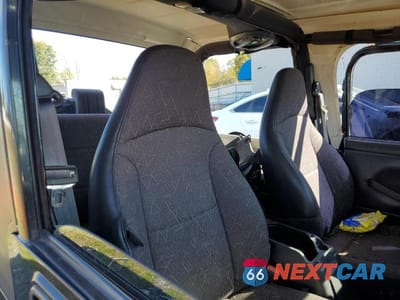 Zdjęcie 11 z 13 samochodu: 2001 JEEP WRANGLER / TJ SPORT VIN:1J4FA49S41P342444 - miniatura
