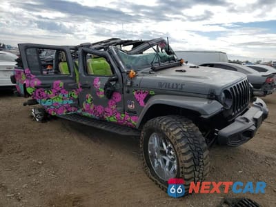 Czwarte zdjęcie samochodu z boku: 2022 JEEP GLADIATOR SPORT VIN:1C6JJTAM1NL165945 - miniatura