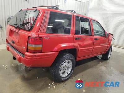 Trzecie zdjęcie samochodu z tyłu: 1998 JEEP GRAND CHEROKEE LIMITED VIN:1J4GZ78Y1WC136047 - miniatura