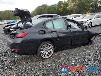 Trzecie zdjęcie samochodu z tyłu: 2023 BMW 330XI VIN:3MW89FF00P8D70011 - miniatura