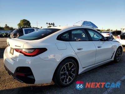 Trzecie zdjęcie samochodu z tyłu: 2022 BMW M440XI GRAN COUPE VIN:WBA13AW04NFM24131 - miniatura