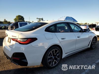 Trzecie zdjęcie samochodu z tyłu: 2022 BMW M440XI GRAN COUPE VIN:WBA13AW04NFM24131 - miniatura