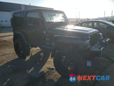 Czwarte zdjęcie samochodu z boku: 1999 JEEP WRANGLER / TJ SAHARA VIN:1J4FY49S5XP478358 - miniatura