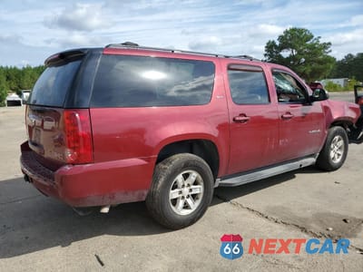 Trzecie zdjęcie samochodu z tyłu: 2010 GMC YUKON XL C1500 SLT VIN:1GKUCKE05AR135084 - miniatura
