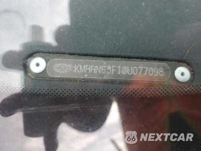 Zdjęcie 12 z 13 samochodu: 2003 HYUNDAI TIBURON VIN:KMHHN65F13U077098 - miniatura