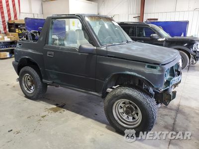 Czwarte zdjęcie samochodu z boku: 1996 GEO TRACKER VIN:2CNBJ1869T6945783 - miniatura