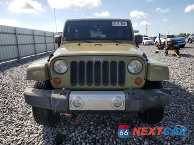 Piąte zdjęcie samochodu w środku: 2013 JEEP WRANGLER UNLIMITED SAHARA VIN:1C4BJWEG4DL532628 - miniatura