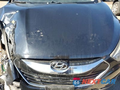 Zdjęcie 12 z 13 samochodu: 2015 HYUNDAI TUCSON LIMITED VIN:KM8JUCAG3FU078808 - miniatura