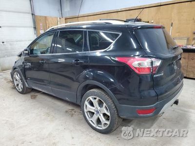 Drugie zdjęcie samochodu z przodu: 2017 FORD ESCAPE TITANIUM VIN:1FMCU9J99HUD26575 - miniatura