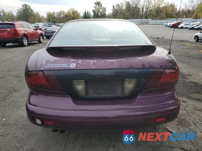 Zdjęcie 6 z 14 samochodu: 1996 PONTIAC SUNFIRE SE VIN:1G2JB1241T7541420 - miniatura