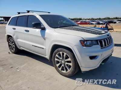 Czwarte zdjęcie samochodu z boku: 2017 JEEP GRAND CHEROKEE OVERLAND VIN:1C4RJECG2HC773508 - miniatura