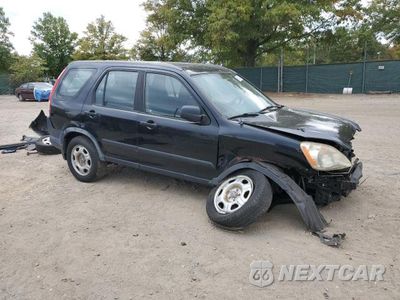 Czwarte zdjęcie samochodu z boku: 2006 HONDA CR-V LX VIN:JHLRD78566C036354 - miniatura