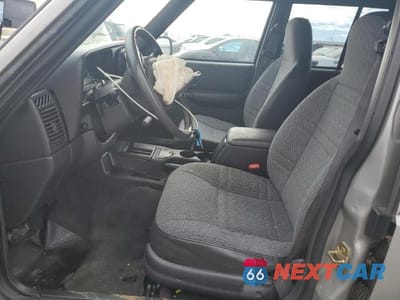 Zdjęcie 7 z 13 samochodu: 2000 JEEP CHEROKEE SPORT VIN:1J4FT48S7YL181665 - miniatura