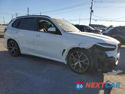 Czwarte zdjęcie samochodu z boku: 2020 BMW X5 SDRIVE 40I VIN:5UXCR4C07LLT19631 - miniatura