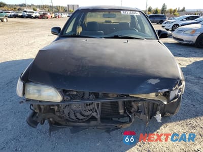 Piąte zdjęcie samochodu w środku: 1997 TOYOTA COROLLA BASE VIN:1NXBA02E0VZ636542 - miniatura