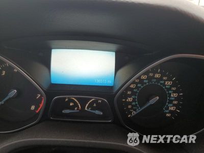Zdjęcie 9 z 13 samochodu: 2012 FORD FOCUS TITANIUM VIN:1FAHP3J21CL342839 - miniatura