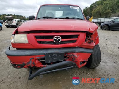 Piąte zdjęcie samochodu w środku: 2001 MAZDA B3000 VIN:4F4YR12U91TM29949 - miniatura