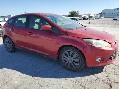 Czwarte zdjęcie samochodu z boku: 2012 FORD FOCUS SE VIN:1FAHP3K21CL289641 - miniatura