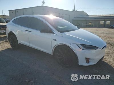 Czwarte zdjęcie samochodu z boku: 2018 TESLA MODEL X VIN:5YJXCBE28JF088584 - miniatura