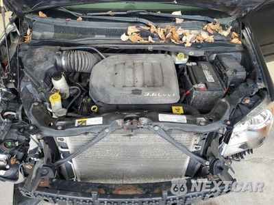 Zdjęcie 12 z 14 samochodu: 2013 DODGE GRAND CARAVAN SXT VIN:2C4RDGCG8DR716234 - miniatura