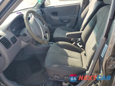 Zdjęcie 7 z 12 samochodu: 2004 HYUNDAI ACCENT GL VIN:KMHCG45C64U499903 - miniatura