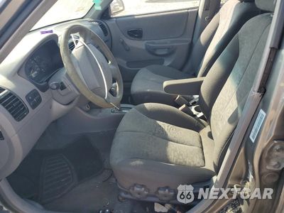 Zdjęcie 7 z 12 samochodu: 2004 HYUNDAI ACCENT GL VIN:KMHCG45C64U499903 - miniatura