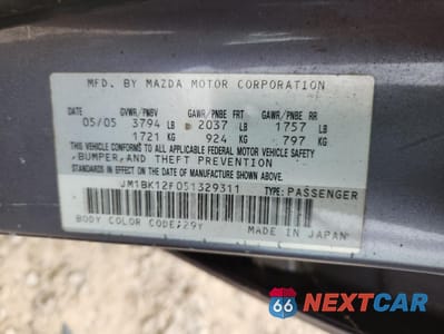 Zdjęcie 12 z 12 samochodu: 2005 MAZDA 3 I VIN:JM1BK12F051329311 - miniatura