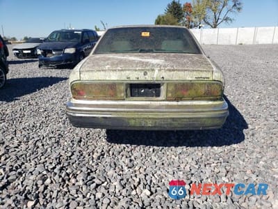 Zdjęcie 6 z 12 samochodu: 1993 BUICK PARK AVENUE ULTRA VIN:1G4CU5317P1613011 - miniatura