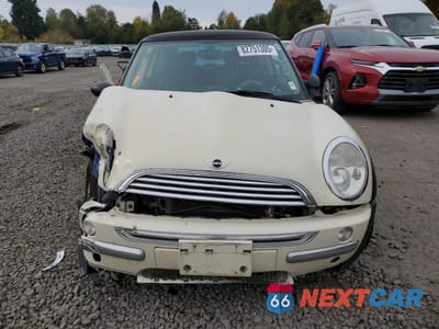 Piąte zdjęcie samochodu w środku: 2003 MINI COOPER VIN:WMWRC33493TE15349 - miniatura