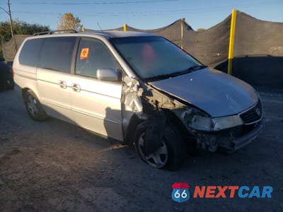 Czwarte zdjęcie samochodu z boku: 2001 HONDA ODYSSEY EX VIN:2HKRL18621H512604 - miniatura