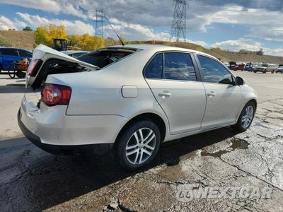 Trzecie zdjęcie samochodu z tyłu: 2010 VOLKSWAGEN JETTA S VIN:3VWJX7AJ1AM041815 - miniatura